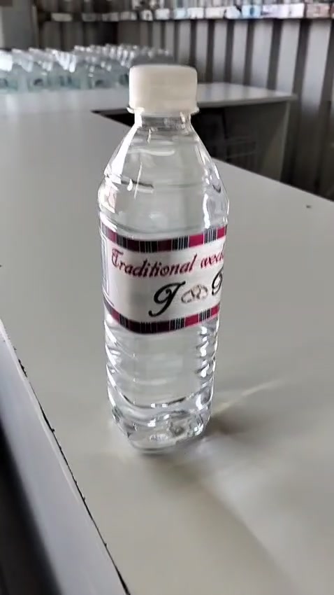 Example of a custom branded water bottle by Rainbow Still Water